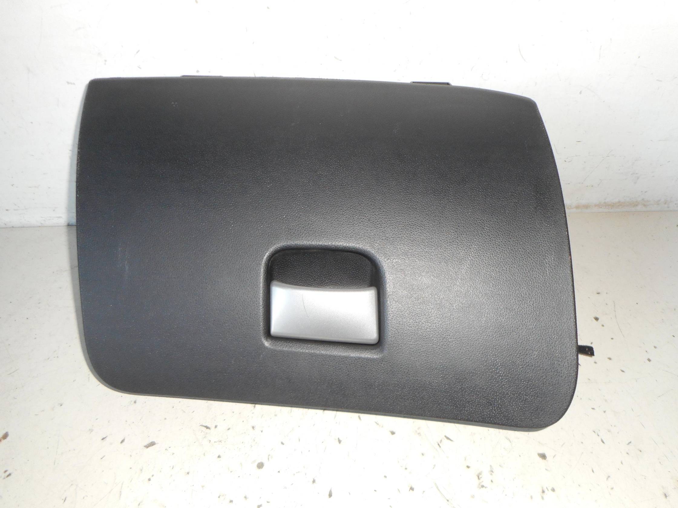 Portaoggetti cruscotto dx.